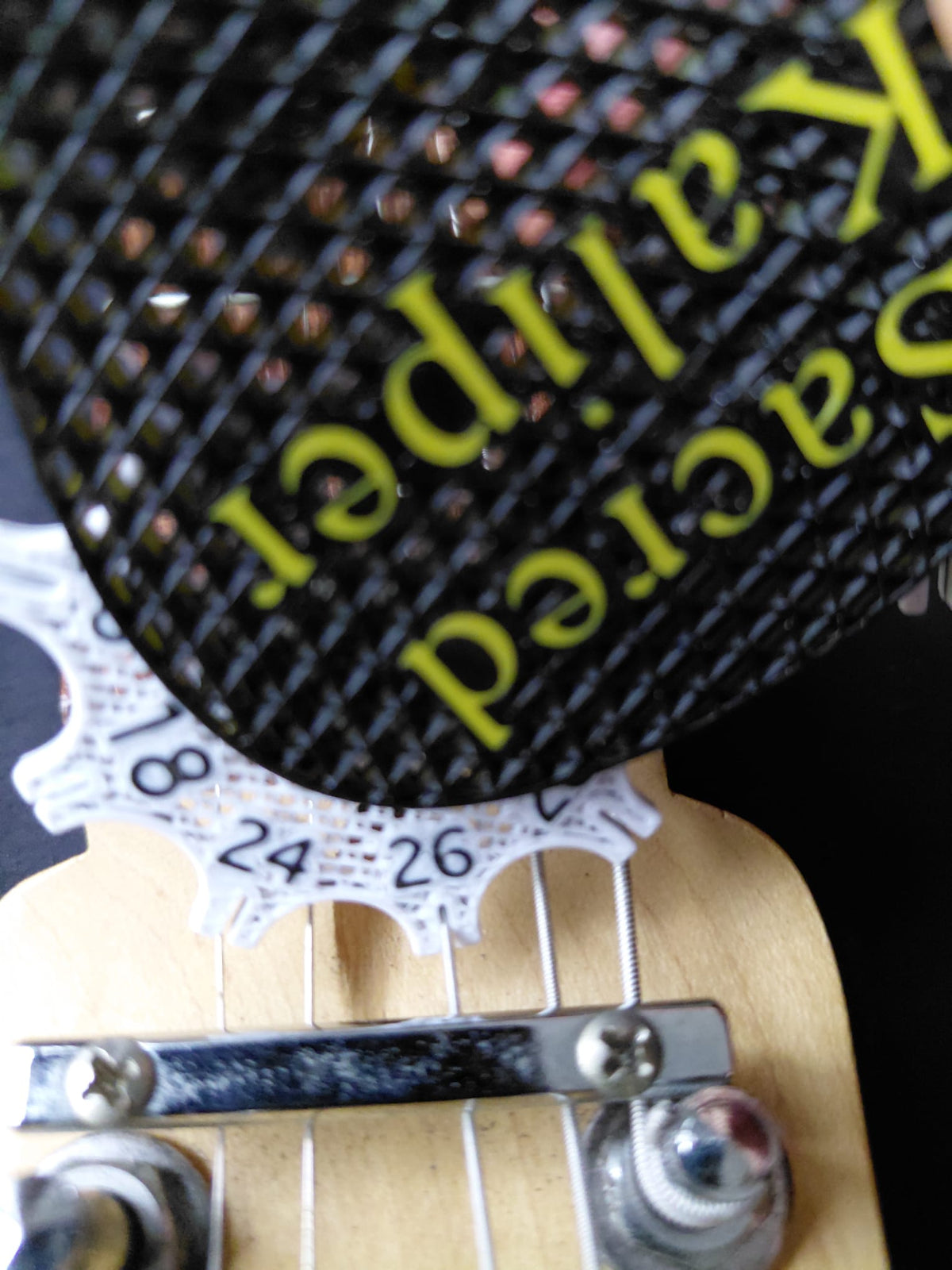 Sacred Kaliper Guitar String Gauge Tool.